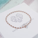 Sterling Silver & Rose Gold Floating Heart Bracelet