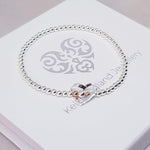 Sterling Silver & Rose Gold Floating Heart Bracelet